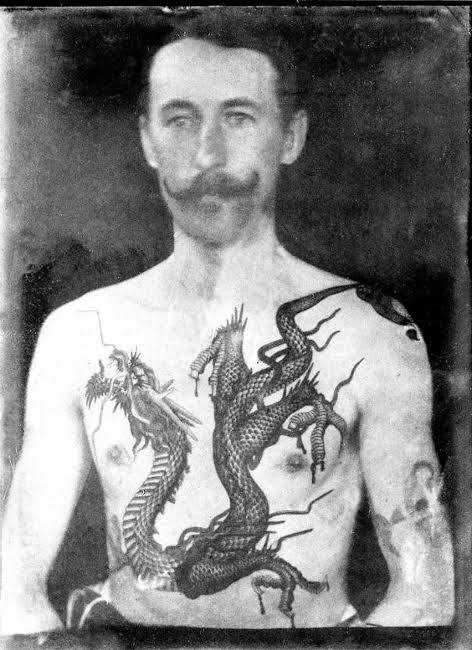 Early Western tattooing — a traditional dragon chest piece
